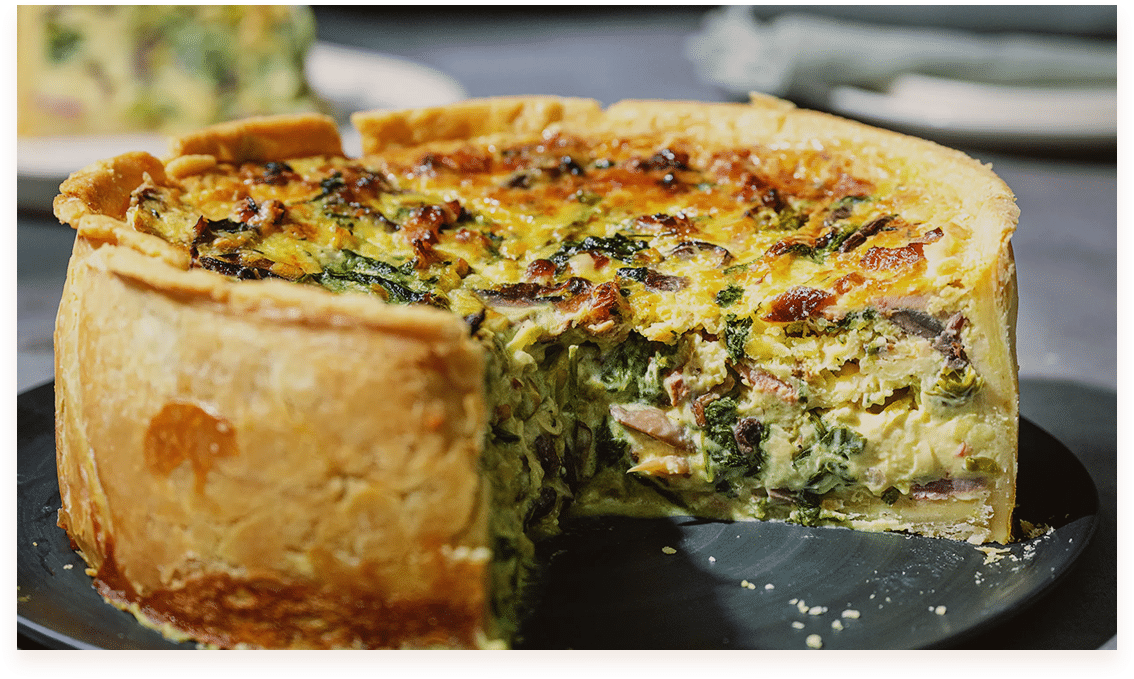 <b> Quiche - $8.00</b> Savory quiche with a flaky crust and a variety of fillings. 